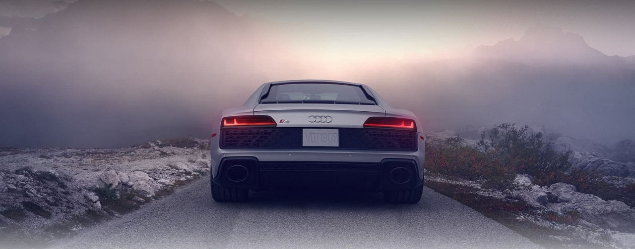 Grey 2021 Audi R8 overlooking mountains
